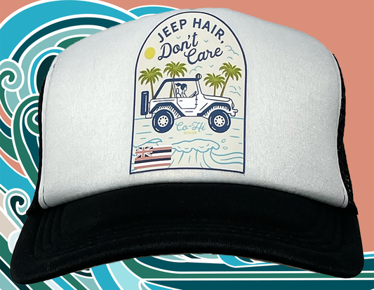 Black and white trucker hat featuring the slogan “Jeep Hair, Don’t Care” with a clear Hawaiian vibe.